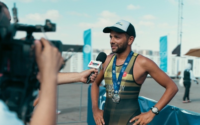 Runner giving interview after winning a race