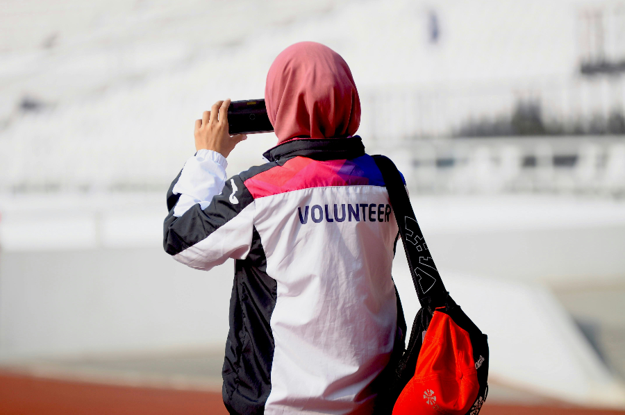 a person taking a picture with their cell phone