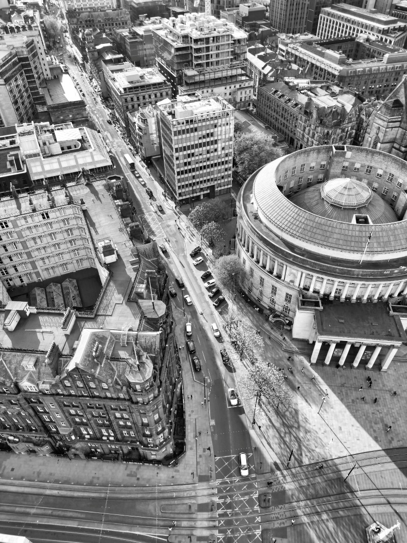 Black and white aerial shot of the area around St Peters Square in Manchester